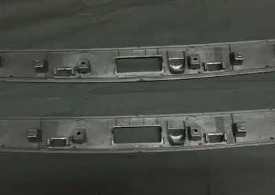 a pair of black plastic bumpers