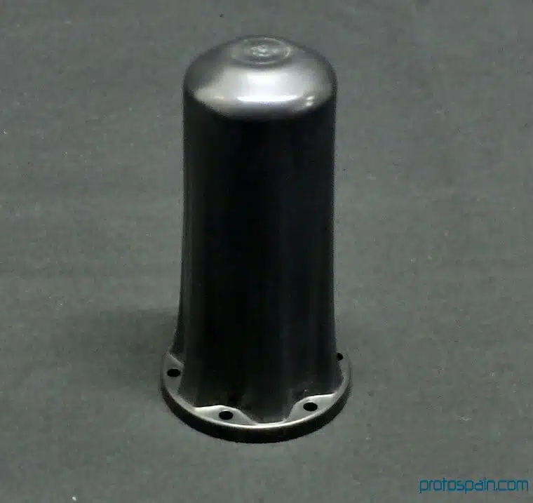 molde-prototipado-ingenieria-abs-negro-uv-protector-1-1 a black cylindrical object with holes