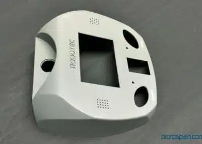 a white object with a square hole
