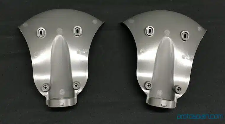 molde-prototipado-ingenieria-pa66+30gf-protector-2-1 a pair of metal parts