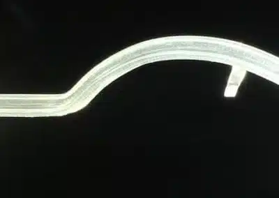 a white plastic curved object